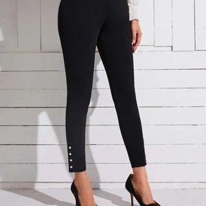 Black dress pants with pearl buttons